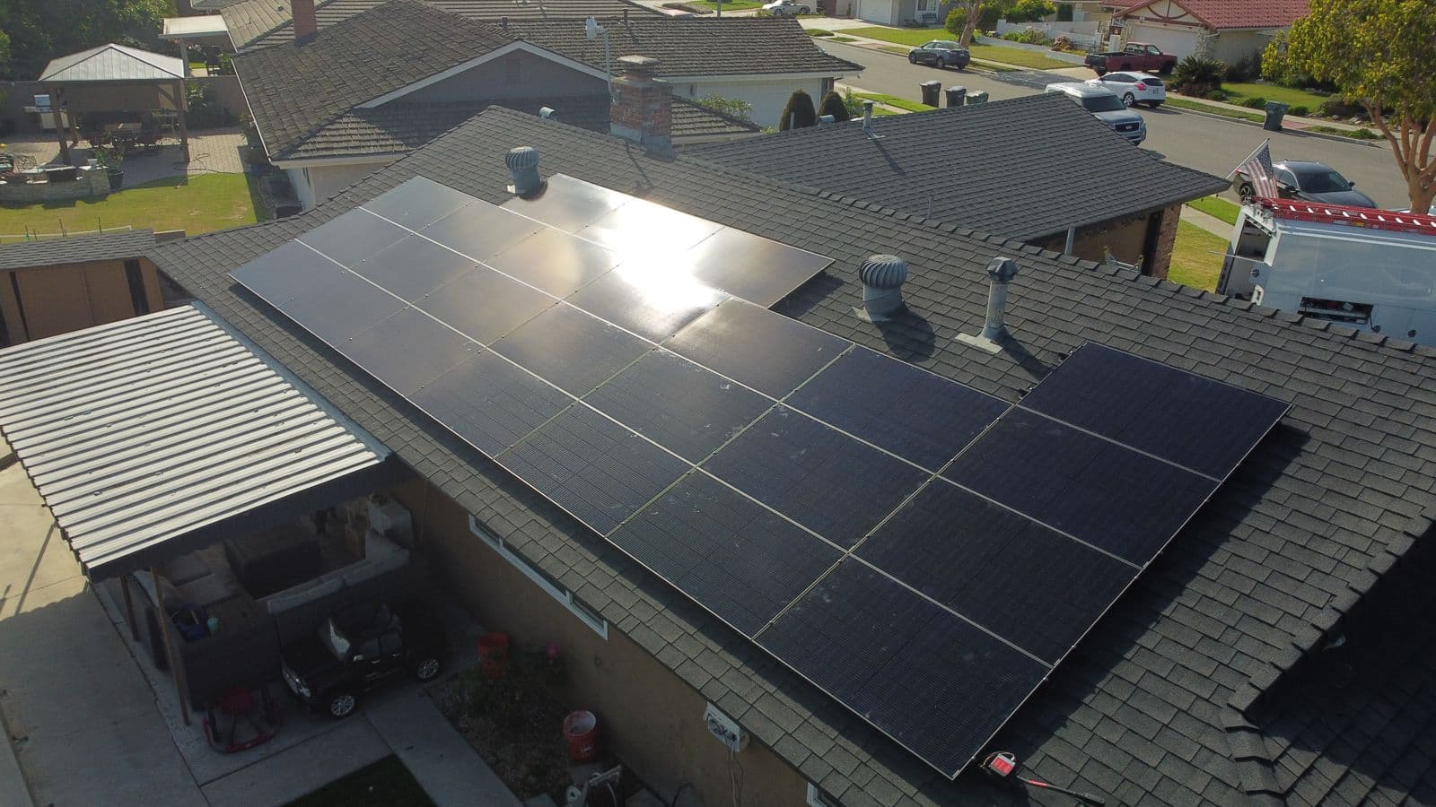 Aerial view of a clean rooftop solar panel installation